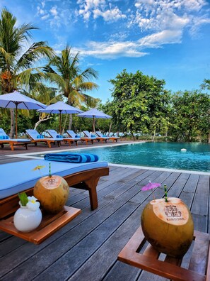 Outdoor pool, pool umbrellas, pool loungers