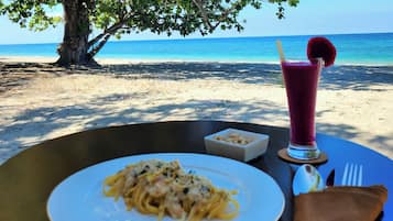 Private beach, white sand, beach towels, beach massages