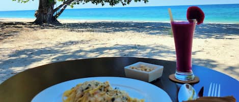 Private beach, white sand, beach towels, beach massages