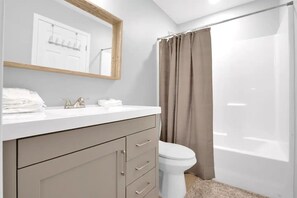 Hair dryer, towels, soap, toilet paper