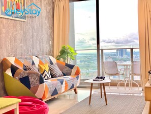 Elite Apartment, 2 Bedrooms, Accessible, City View | Living area | 48-inch Smart TV with digital channels, video-game console, Netflix - Silverscape Residence (Malacca City)