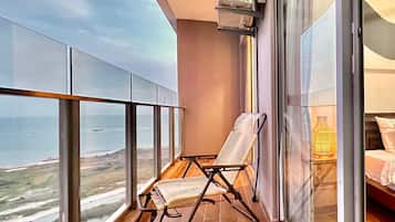 Romantic Apartment, 2 Bedrooms, Sea View, Sea Facing | Living area | 48-inch Smart TV with digital channels, video game console, Netflix