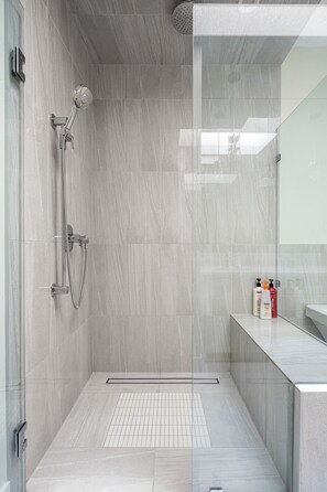 Shower, hair dryer, towels, soap