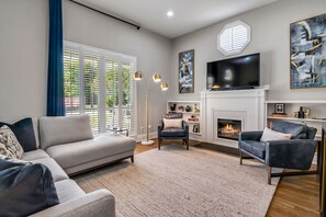 Smart TV, fireplace, books