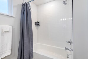 Hair dryer, towels, soap, shampoo