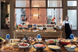 Daily buffet breakfast (USD 20 per person)