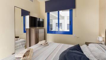 1 dormitorio, tabla de planchar con plancha, wifi gratis y ropa de cama