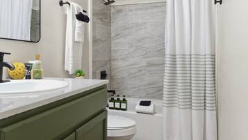 Hair dryer, towels, soap, shampoo