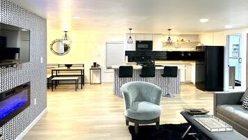 Smart TV, fireplace, music library, computer monitors