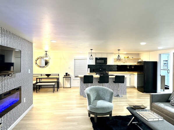 Smart TV, fireplace, music library, computer monitors