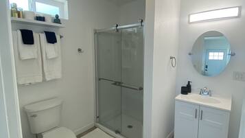 Shower, towels, soap, shampoo