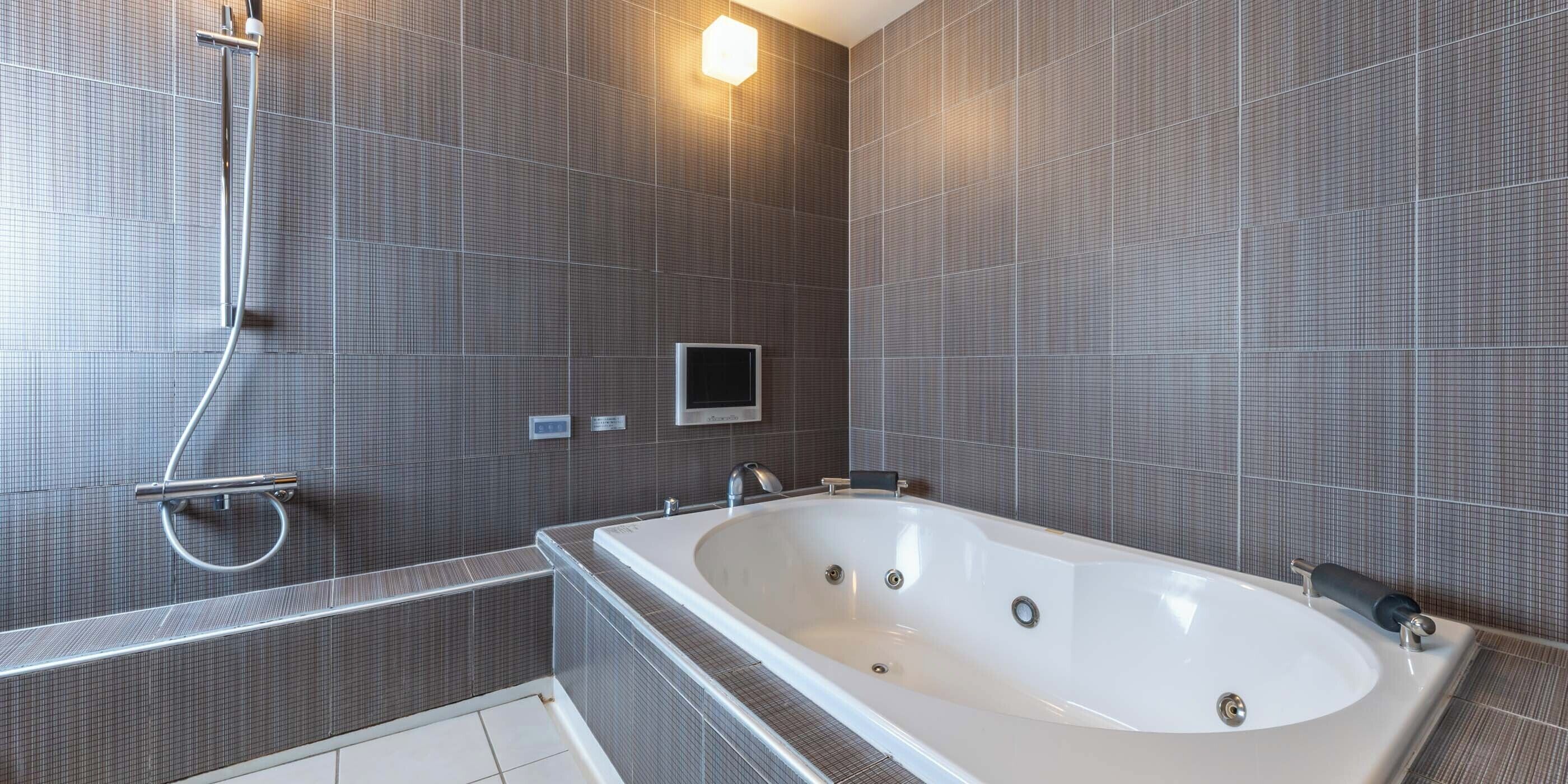 royal double room | bathroom | free toiletries, hair dryer, slippers, towels