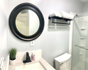 Shower, hair dryer, towels, soap