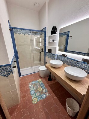 Shower, free toiletries, hair dryer, bathrobes