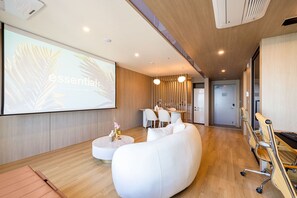 Penthouse Ocean View | Living area | 55-inch flat-screen TV with cable channels, heated floors