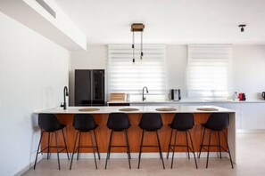 Luxury Apartment | Private kitchen | Full-size fridge, microwave, oven, stovetop