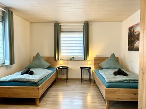 4 bedrooms, desk, iron/ironing board, travel cot