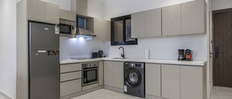 Apartment, 2 Bedrooms | Private kitchen | Fridge, microwave, oven, stovetop