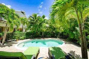 A heated pool - A Sea Star by Beach Boutique Rentals (Anna Maria)