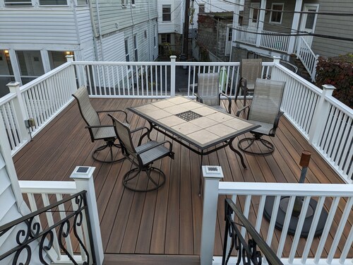 Large, sunny duplex on a quiet street - off-street parking and outdoor space!