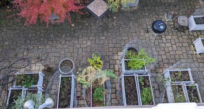 Large, sunny duplex on a quiet street - off-street parking and outdoor space!