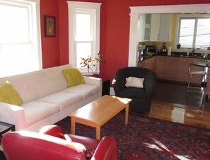 Living area - Large, sunny duplex on a quiet street - off-street parking and outdoor space! (Somerville)
