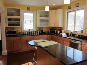 Private kitchen - Large, sunny duplex on a quiet street - off-street parking and outdoor space! (Somerville)