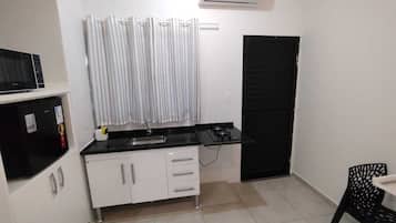 Fridge, microwave, stovetop, cookware/dishes/utensils