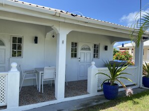 Outdoor dining - Anchor Villa , 4 bedroom single family home 
Steps to the beach . (Oistins)