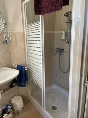 Shower, hair dryer, soap, shampoo