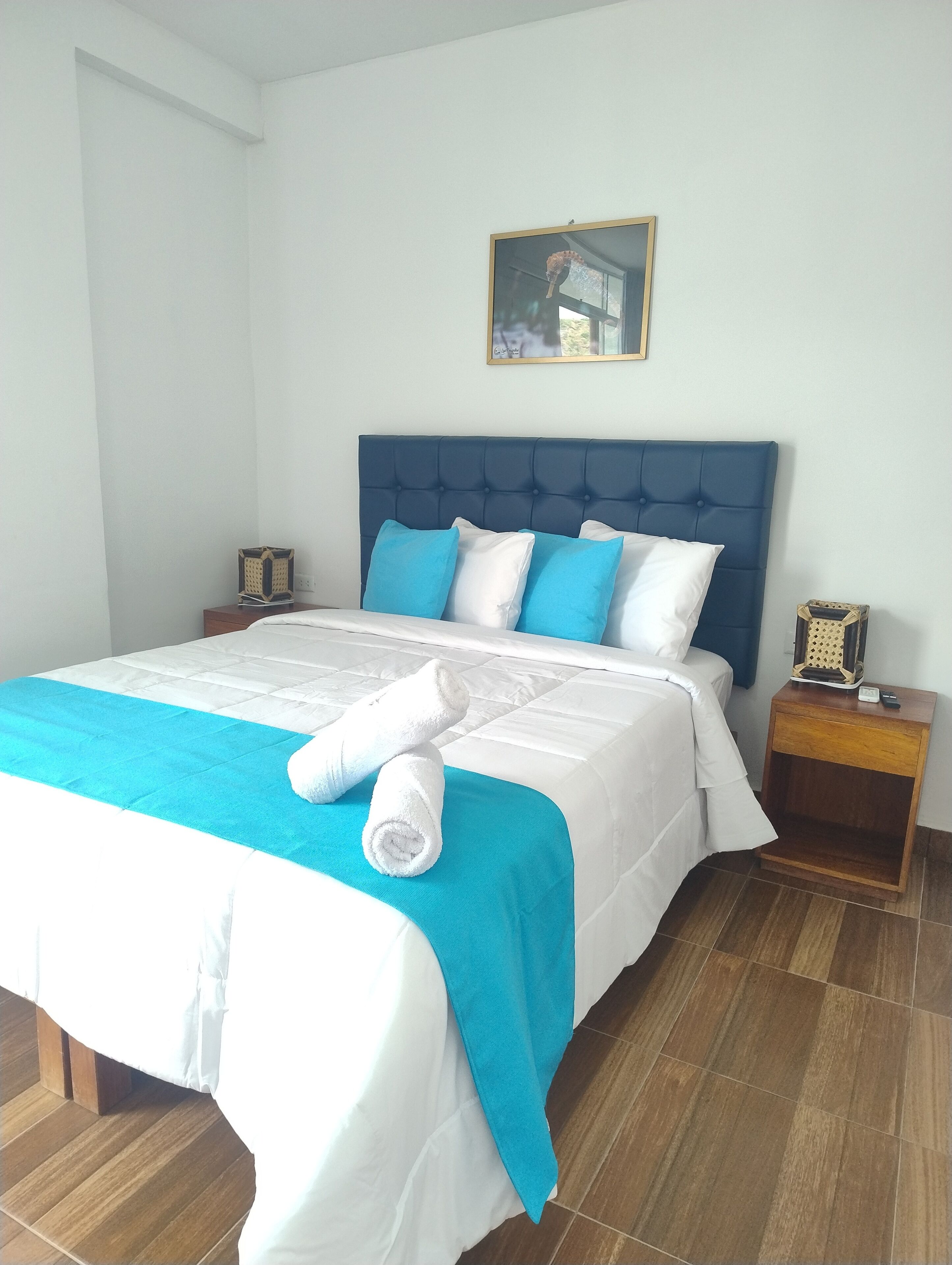 Premium bedding, down comforters, laptop workspace, WiFi (free)