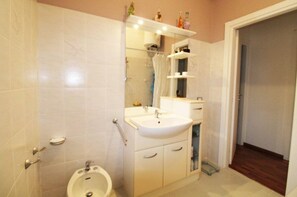 Hair dryer, bidet, towels, soap