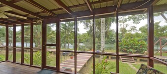 Beautiful cabin nestled in tropical surroundings on the Banks of the Sitee River