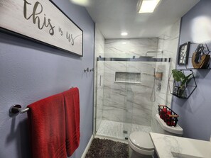 Shower, hair dryer, towels, soap