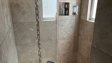 Shower, towels, soap, shampoo