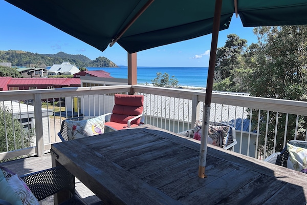 overlooking whangapoua beach and place to havel outdoor meals