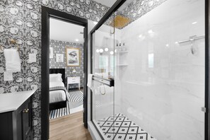 Shower, hair dryer, towels, soap