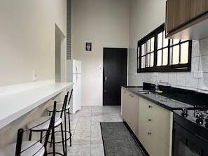 Basic Apartment | Private kitchen | Fridge, blender, cookware/dishes/utensils