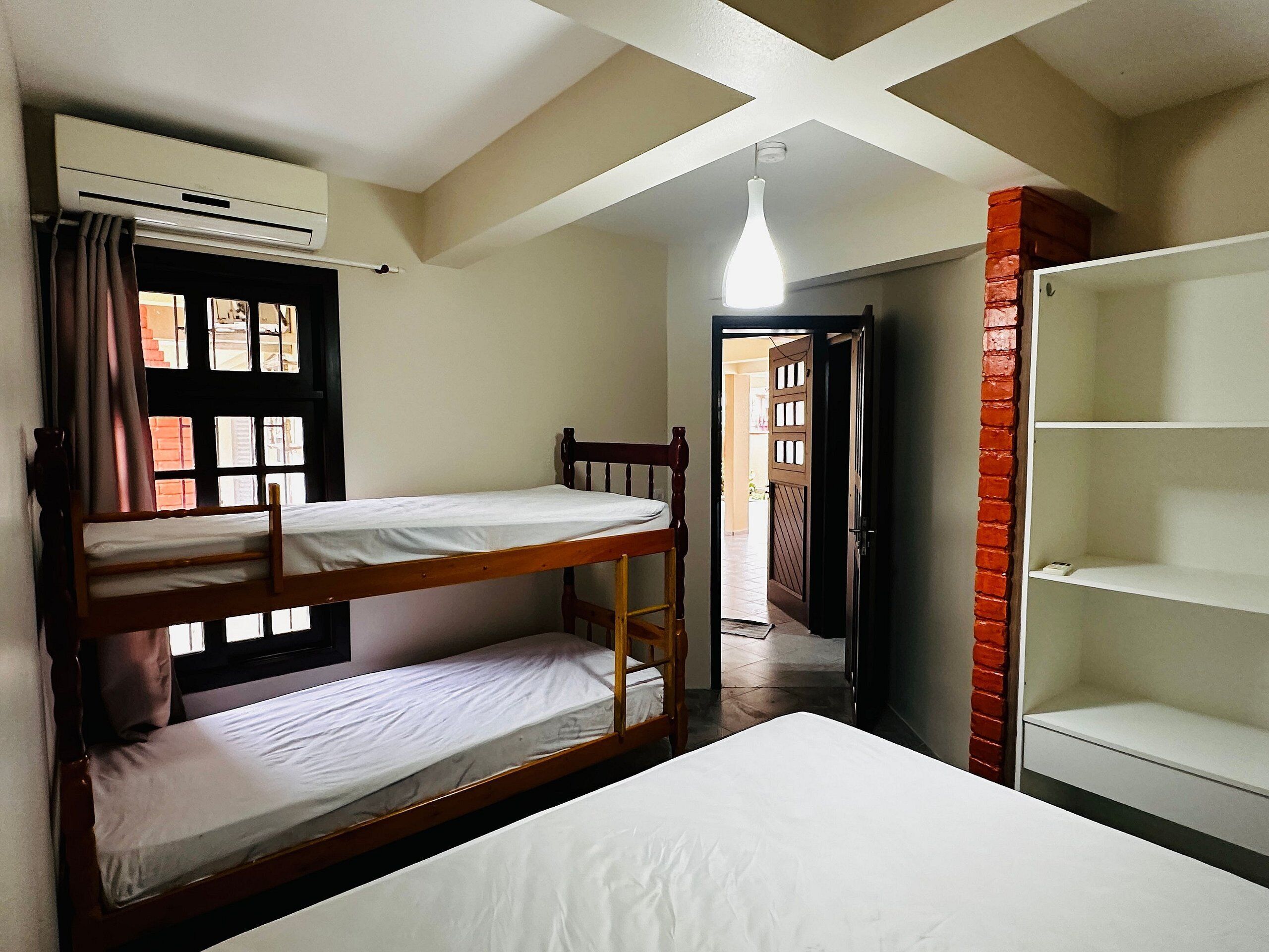 Apartamento família | Cortinas blackout, ferros/tábuas de passar roupa, Wi-Fi de cortesia