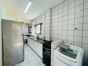 Family Apartment | Private kitchen | Fridge, blender, cookware/dishes/utensils