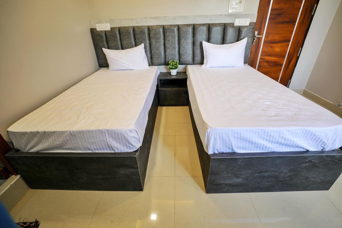 Double or Twin Room | In-room safe, blackout curtains, free WiFi, bed sheets