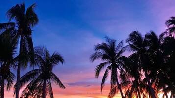 On the beach, white sand, beach towels