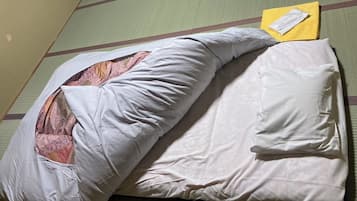 Standard Quadruple Room | Down comforters, in-room safe, blackout drapes