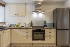 Enjoy cooking a meal together in the spacious kitchen