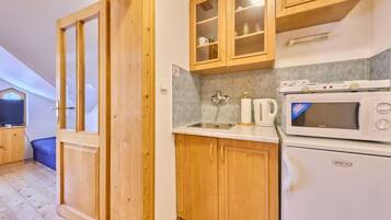 Fridge, microwave, toaster, cookware/dishes/utensils