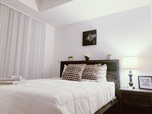 Comfort Room | 1 bedroom, iron/ironing board, free WiFi, bed sheets
