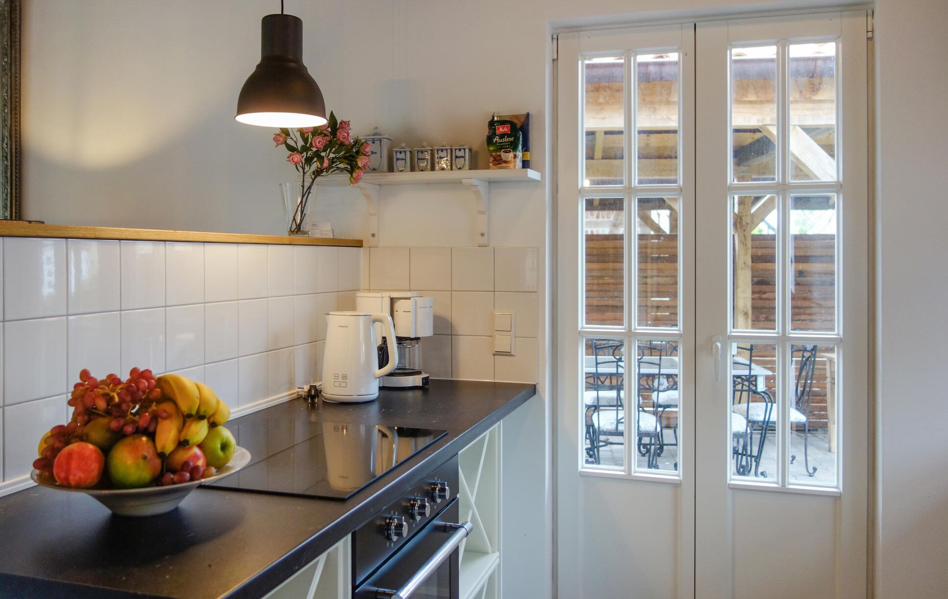 Fridge, stovetop, dishwasher, coffee/tea maker