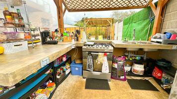 Fridge, microwave, blender, cookware/dishes/utensils