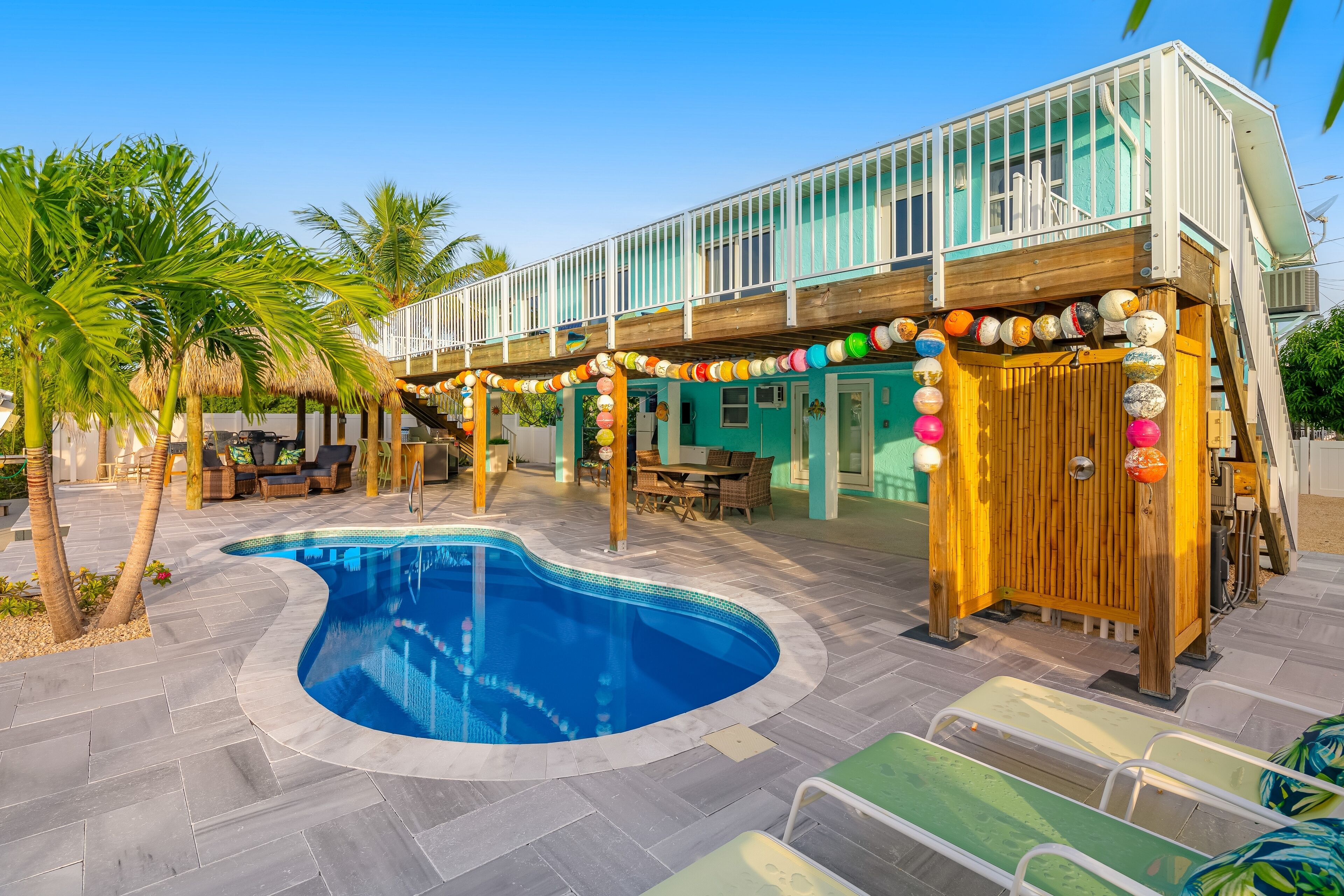 Snowbird-friendly canal-front home w/private pool, private dock, outdoor shower