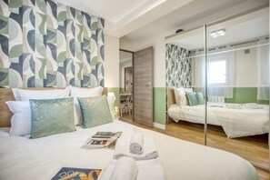 3 habitaciones, tabla de planchar con plancha, wifi y ropa de cama 